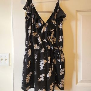 Black romper with white floral design